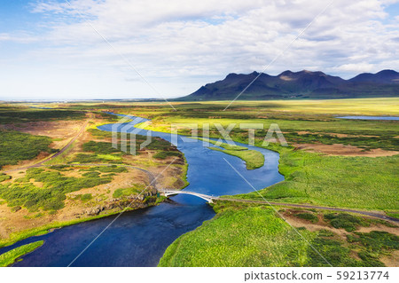 Iceland. Aerial view on the mountain, field, bridge and river. 59213774