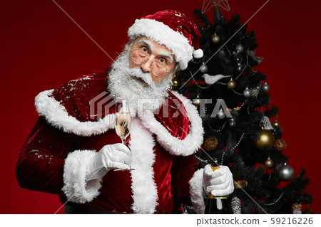 Classic Santa Claus Holding Champagne Classic Santa Claus Holding Champagne 59216226