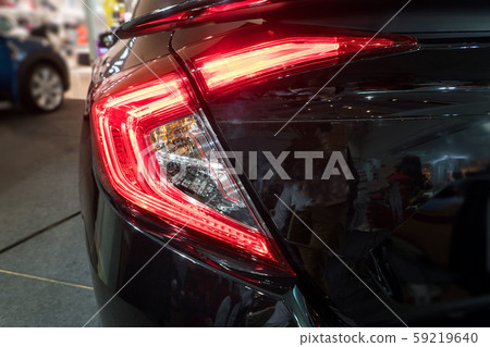 Detail on the rear light of a black. black sport Detail on the rear light of a black. black sport 59219640