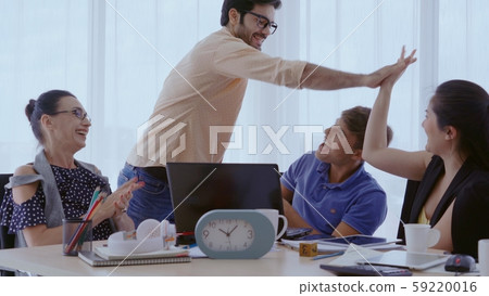 Successful business people celebrating success. Successful business people celebrating success. 59220016