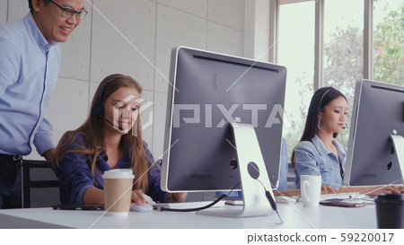 Customer support agent or call center with headset Customer support agent or call center with headset 59220017