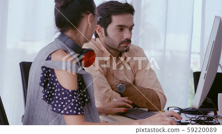 Creative business people having group conversation Creative business people having group conversation 59220089