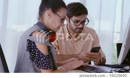 Creative business people having group conversation Creative business people having group conversation 59220095