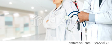 Doctor working in hospital with other doctors. Doctor working in hospital with other doctors. 59220178
