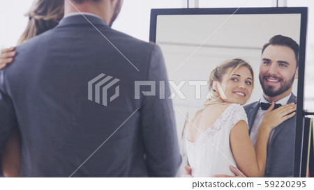 Bride and groom in wedding dress prepare ceremony. 59220295