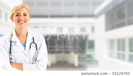 Woman doctor working at the hospital office. Woman doctor working at the hospital office. 59220793