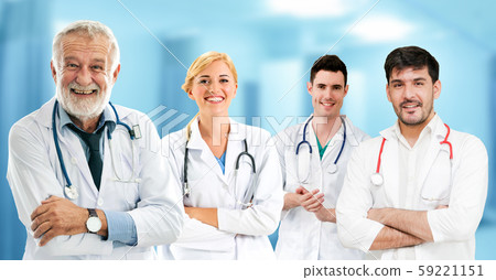 Doctor working in hospital with other doctors. 59221151