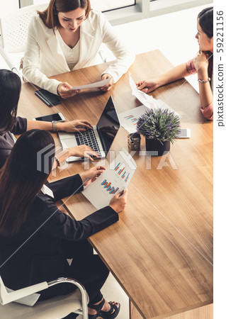 Businesswomen in Meeting, Laptop Computer on Table Businesswomen in Meeting, Laptop Computer on Table 59221156