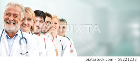 Doctor working in hospital with other doctors. Doctor working in hospital with other doctors. 59221238