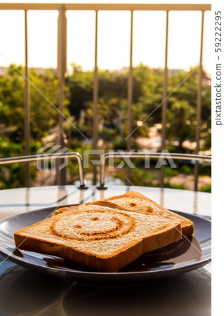 Breakfast with morning light at the balcony 59222295