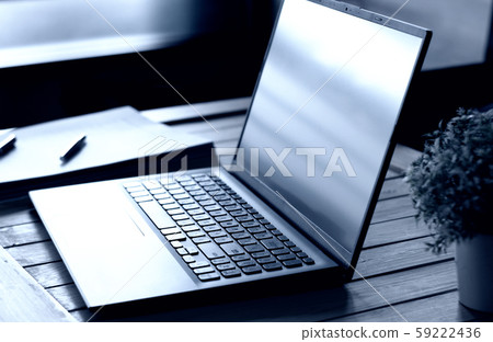 computer laptop with paperwork on desk computer laptop with paperwork on desk 59222436