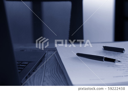 computer laptop and pen on paperwork computer laptop and pen on paperwork 59222438
