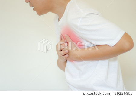 Sick man having painful Chest having heart attack at home,Hands squeezing Chest.healthcare concept  59226893