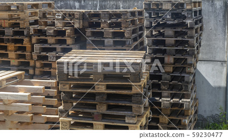 wooden Europalets lie in the warehouse closeup wooden Europalets lie in the warehouse closeup 59230477
