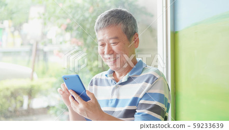 elder man use smart phone elder man use smart phone 59233639