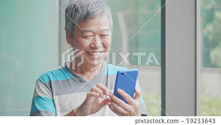old man use smart phone old man use smart phone 59233643