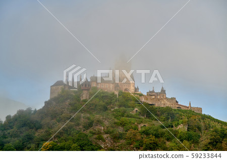 Beautiful Reichsburg castle on a hill in Cochem, Beautiful Reichsburg castle on a hill in Cochem, 59233844