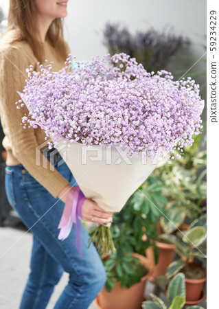 Lilac gypsophila. Beautiful bouquet of mixed... - Stock Photo