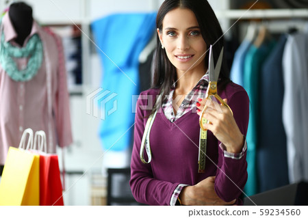 Business person with scissors 59234560