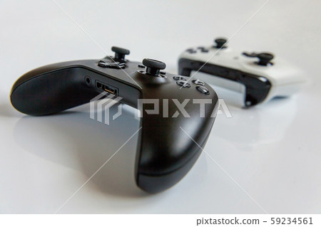 White and black two joystick gamepad, game console White and black two joystick gamepad, game console 59234561