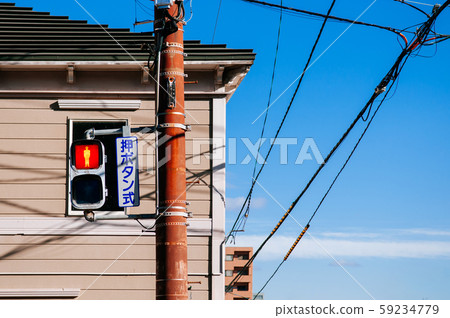 Street traffic light crosswalk sign against blue Street traffic light crosswalk sign against blue 59234779