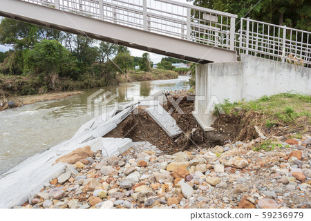 Typhoon damage river flooding embankment collapse Typhoon damage river flooding embankment collapse 59236979