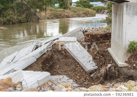 Typhoon damage river flooding embankment collapse 59236981