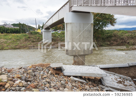 Typhoon damage river flooding embankment collapse Typhoon damage river flooding embankment collapse 59236985