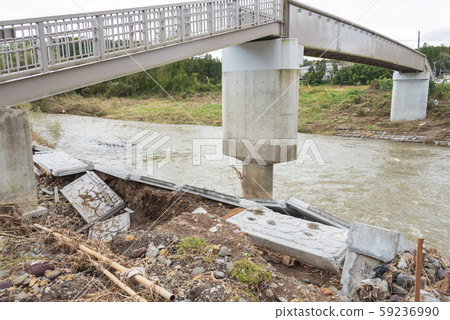 Typhoon damage river flooding embankment collapse Typhoon damage river flooding embankment collapse 59236990