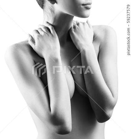 Portrait of lovely naked redhead woman covering her breast. Portrait of lovely naked redhead woman covering her breast. 59237579