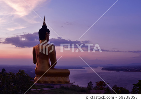 The big golden Buddha statue of Phu Salao temple The big golden Buddha statue of Phu Salao temple 59238055