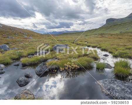 Lapland landscape with small pond, stones Lapland landscape with small pond, stones 59238653