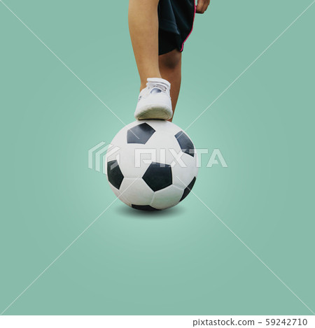 Closeup feet of a boy wearing white sneakers Closeup feet of a boy wearing white sneakers 59242710