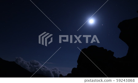 Moon and rock silhouette 59243868