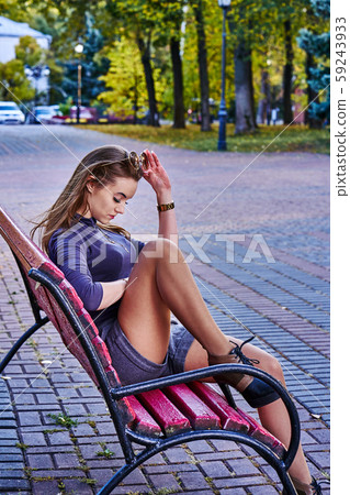A young woman with long hair in a turtleneck, 59243933