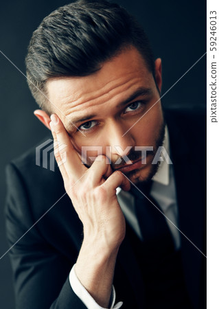 Thoughtful handsome man portrait Thoughtful handsome man portrait 59246013