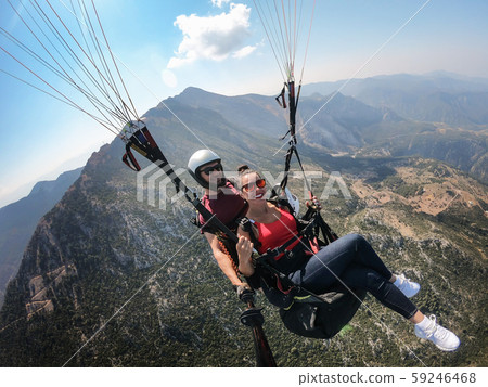 Flying on a paraglider. View of the coast from a 59246468