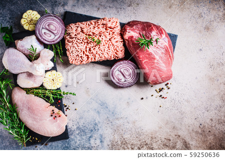 Carnivore diet concept. Raw meat of chicken, beef 59250636