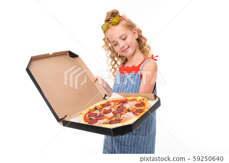 Picture of happy child with fair red curly hair eats tasty pizza 59250640