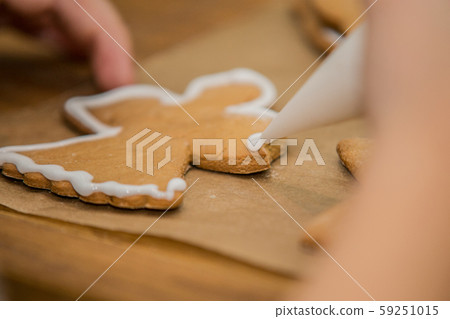 The chef in the kitchen prepares honey cake The chef in the kitchen prepares honey cake 59251015