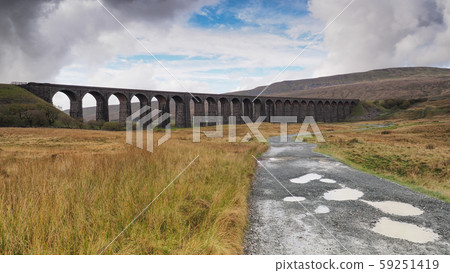 Ribblehead Viaduct or Batty Moss Viaduct carrying the Settle to Carlisle railway, Yorkshire Dales 59251419