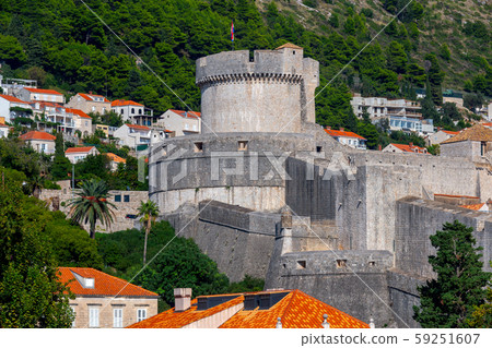 Dubrovnik. Old city walls and towers at sunset. 59251607