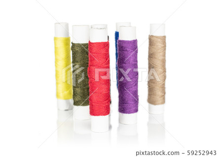 Sewing thread spool isolated on white 59252943