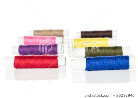 Sewing thread spool isolated on white 59252946