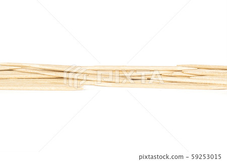 Wooden brown toothpick isolated on white 59253015