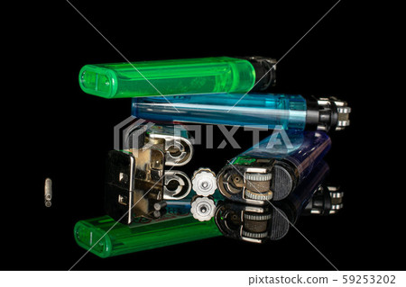 Plastic lighter isolated on black glass 59253202