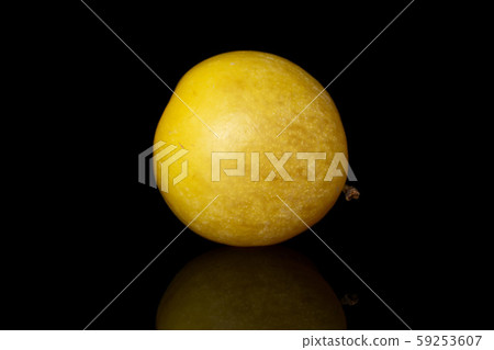 Fresh yellow plum isolated on black glass 59253607