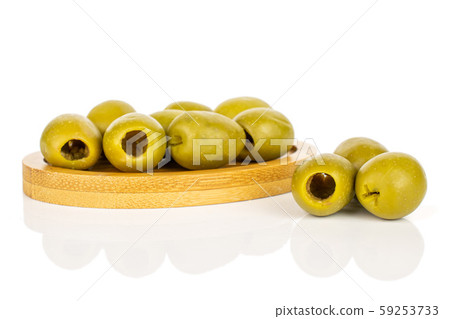 Green pitted olive fruit isolated on white Green pitted olive fruit isolated on white 59253733