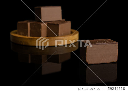 Sweet viennese nougat isolated on black glass 59254338