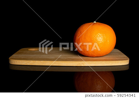 Fresh orange mandarine isolated on black glass Fresh orange mandarine isolated on black glass 59254341